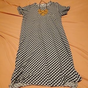Lularoe Carly Sz MD, but can fit up to XXL imo.